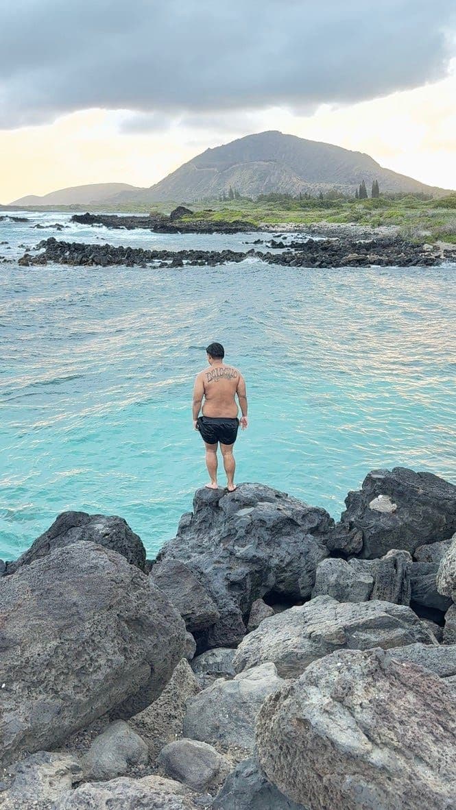 Alan Davis Beach — some guys where jumping into the clear water below